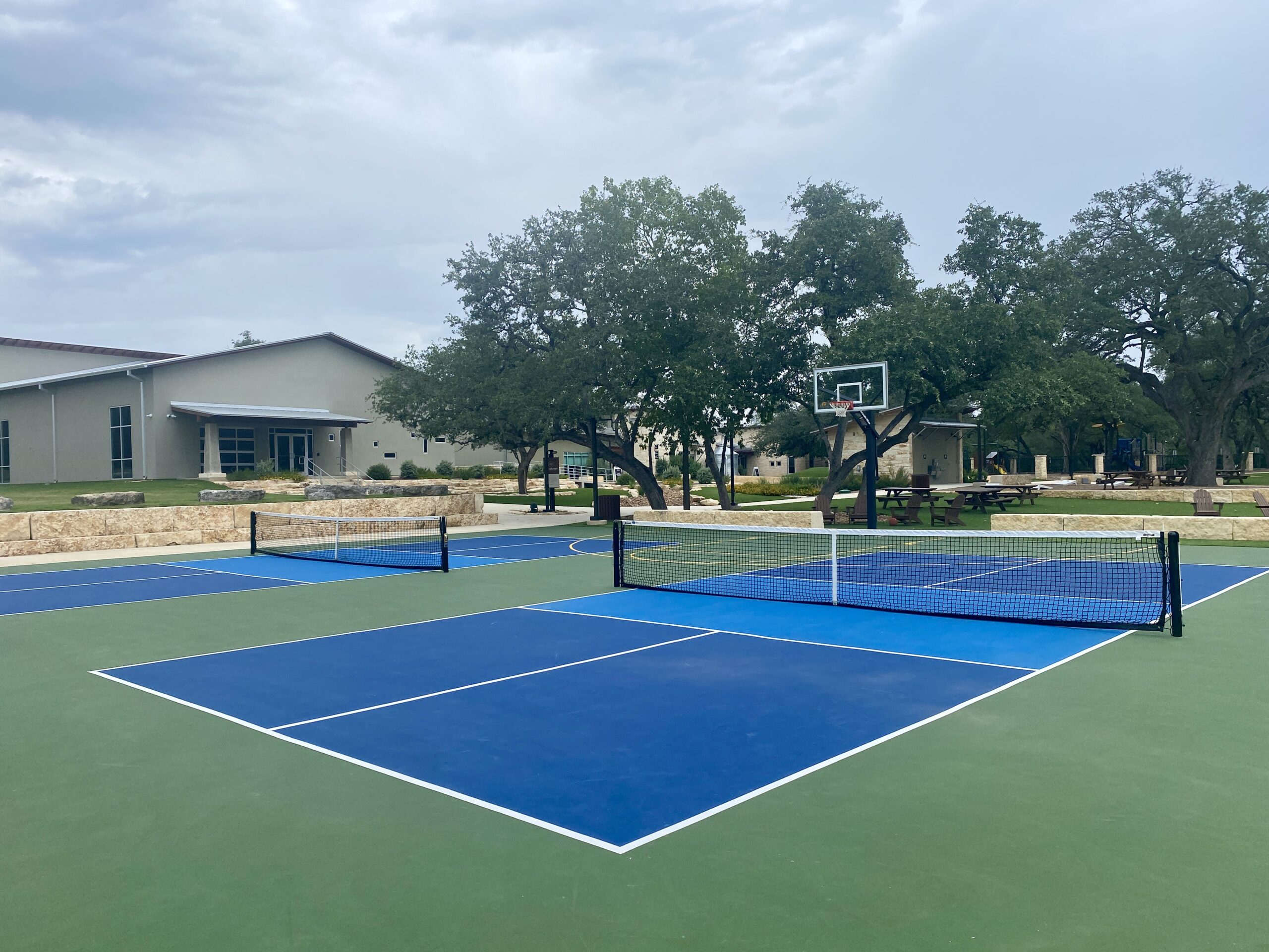 Outdoor pickleball courts at Oaks Park in Wimberley Texas