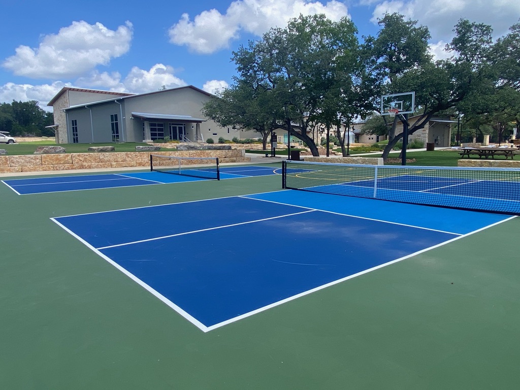 Pickleball and Basketball courts at Oaks Park in Wimberley Texas.