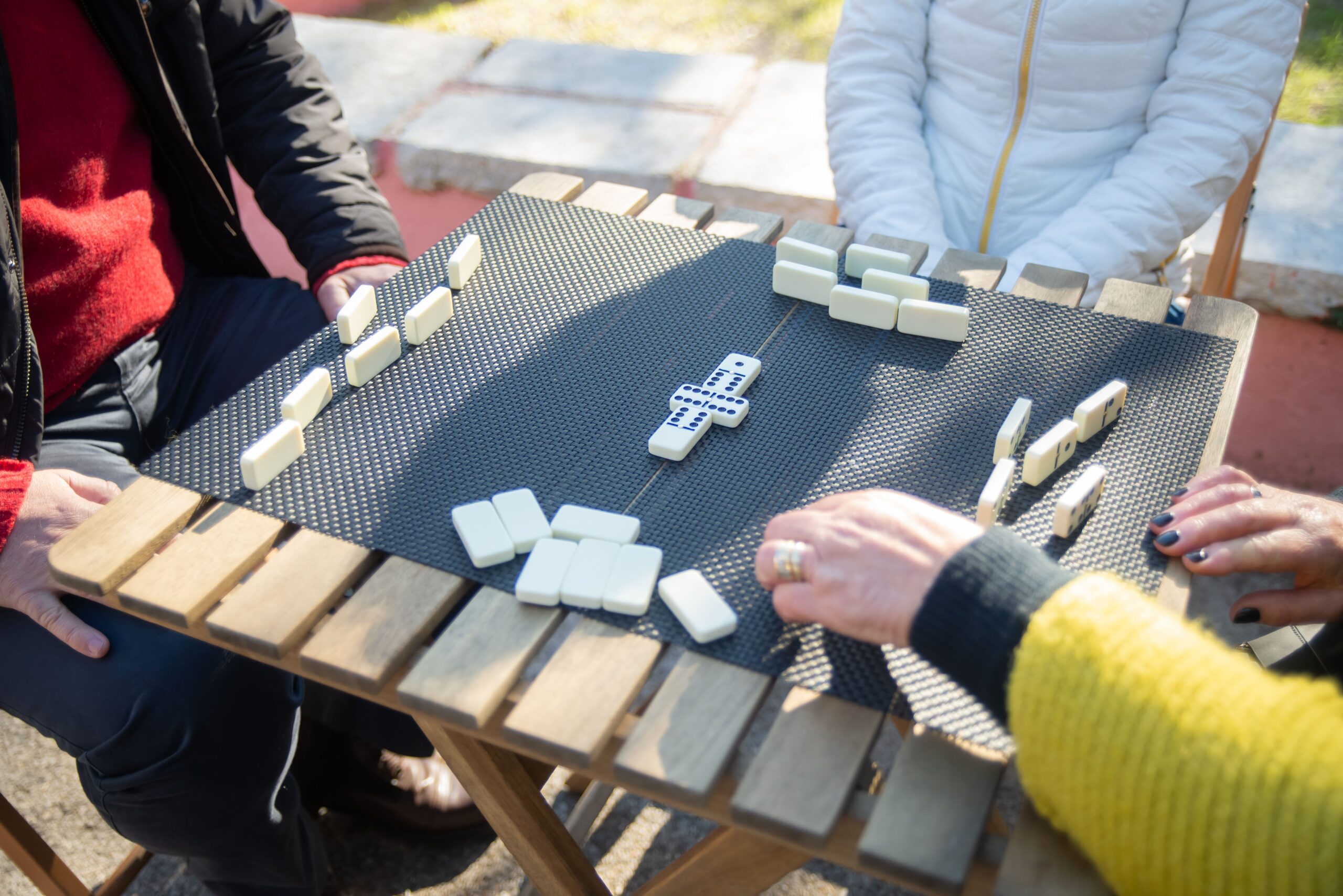 group playing dominoes